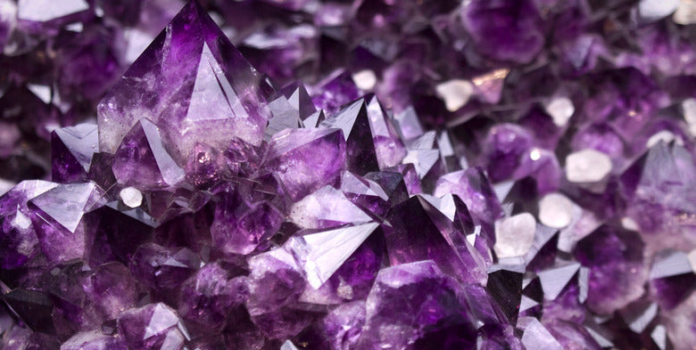 Exploring the Energies of Four Powerful Gemstones: Lapis Lazuli, Tiger Eye, Rose Quartz, and Amethyst